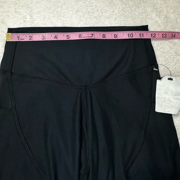 UFC Women's Black Bike Shorts with Red Logo and Side Pockets - Picture 8 of 12